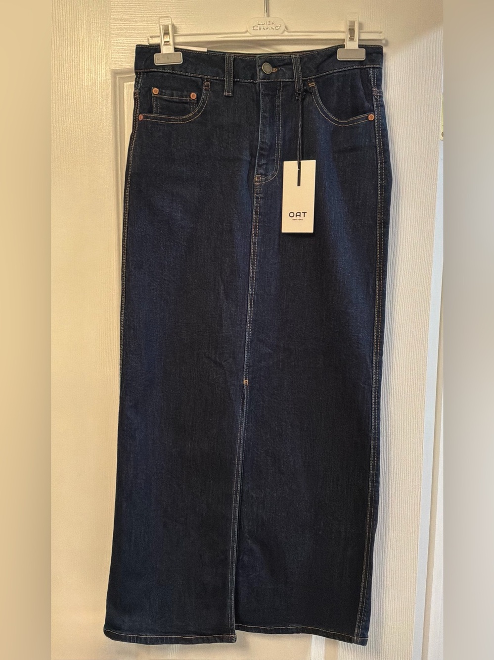 Women’s blue denim skirt from Oat New York.